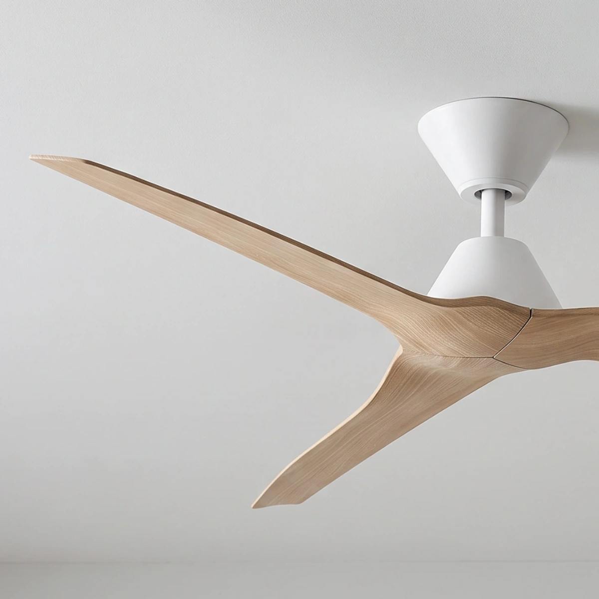 fanco-infinity-id-dc-54-inch-ceiling-white-with-beechwood-timber-style-blades-angled-close-up-insitu.webp