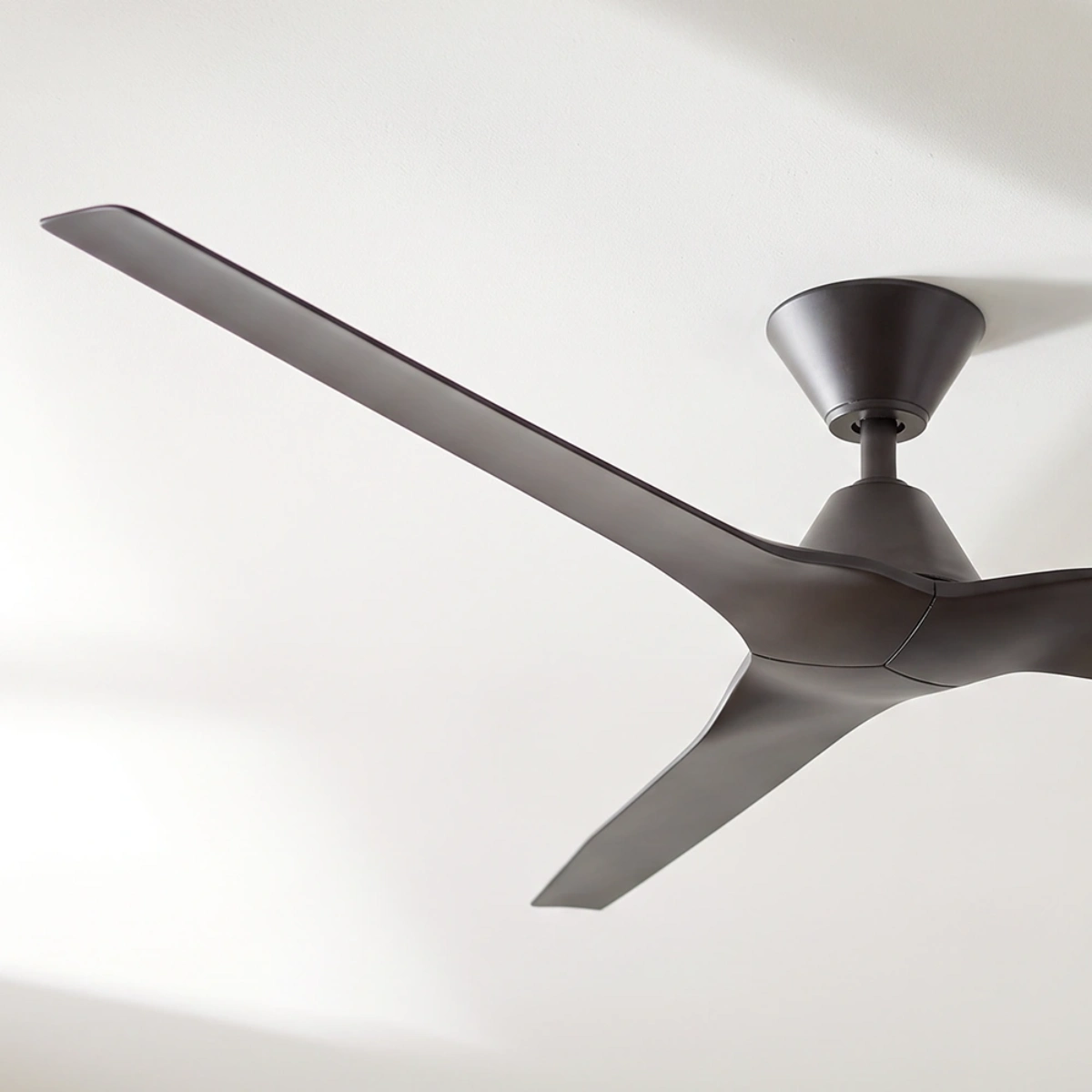 fanco-infinity-id-dc-60-inch-ceiling-fan-black-angled-close-up-insitu.webp