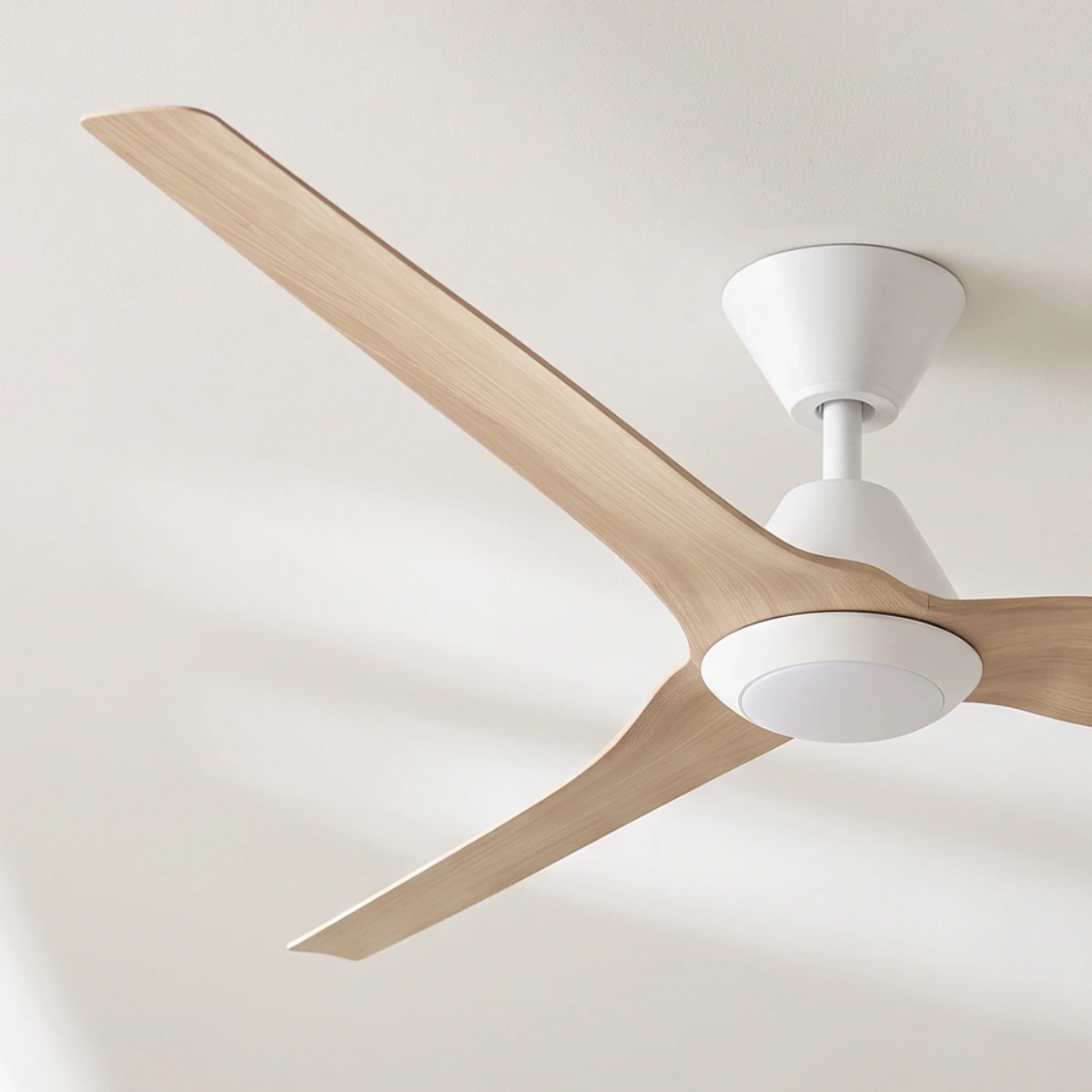 fanco-infinity-id-dc-60-inch-ceiling-fan-with-led-light-white-with-beechwood-timber-style-blades-angled-close-up-insitu.